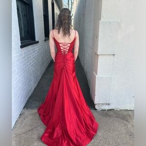 This red prom dress is a size 4 beautiful Abby Paris dress.